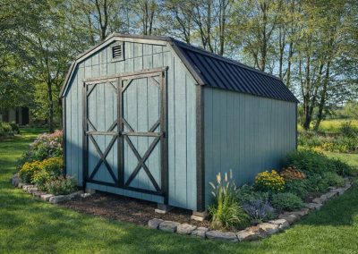 Blue Amish shed with black roof and barn-style doors