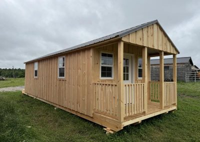 Amish built cabin with a covered porch