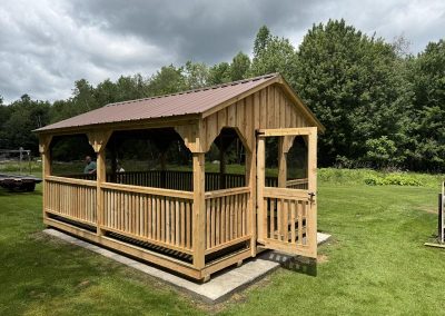 Amish pavilion with white trim and screened porch