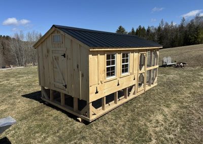 Amish chicken coop with wire-enclosed run