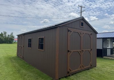 Amish made brown shed with lighter brown trim